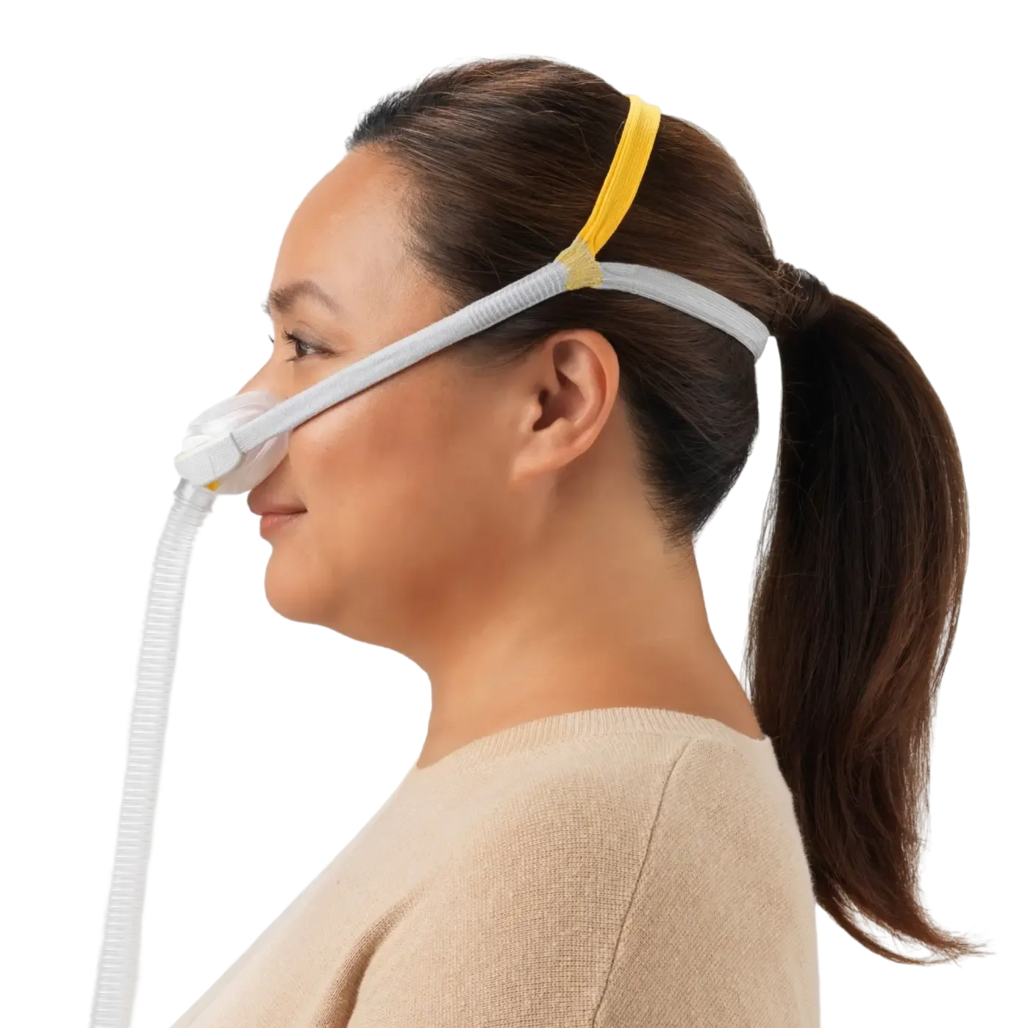 Side-view image of a woman wearing a Solo Mask, which includes the Solo Mask Headgear.